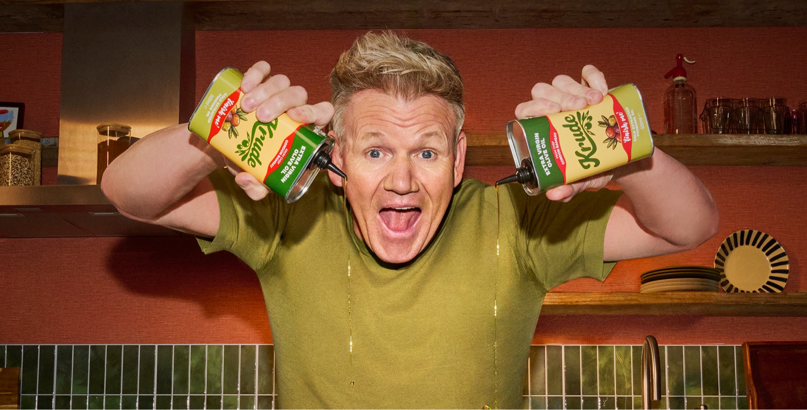 Krude olive oil campaign cover with Gordon Ramsay holding two tins.
