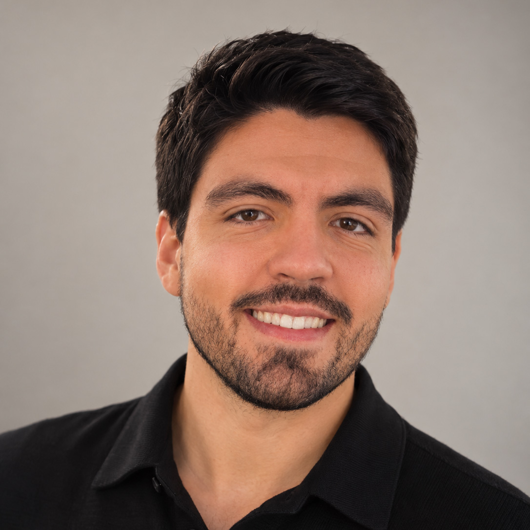 Mauro Hernandez smiling in a black shirt.